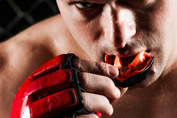 Leia mais sobre o artigo Você sabia que a prática de alguns esportes requer o uso de Protetor Bucal?